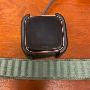 Fitbit Versa Smartwatch with band and charger